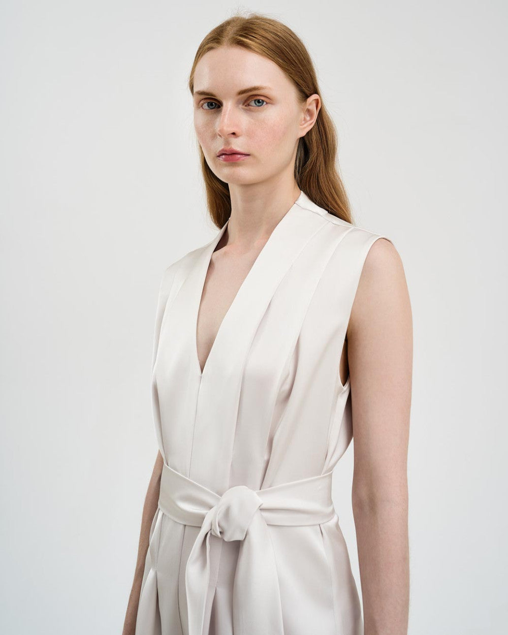 Tuta in raso con pieghe