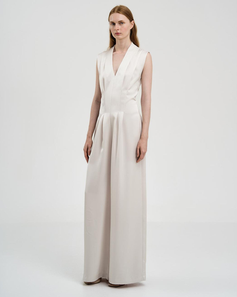 Tuta in raso con pieghe