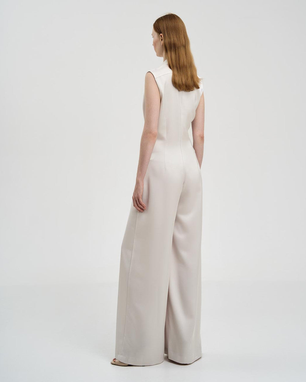 Tuta in raso con pieghe