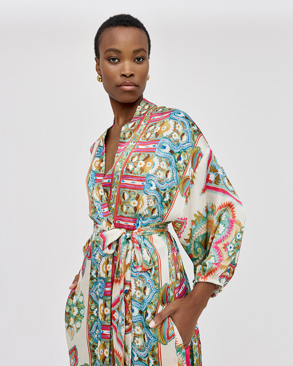 Blusa lunga stampata con cintura da annodare