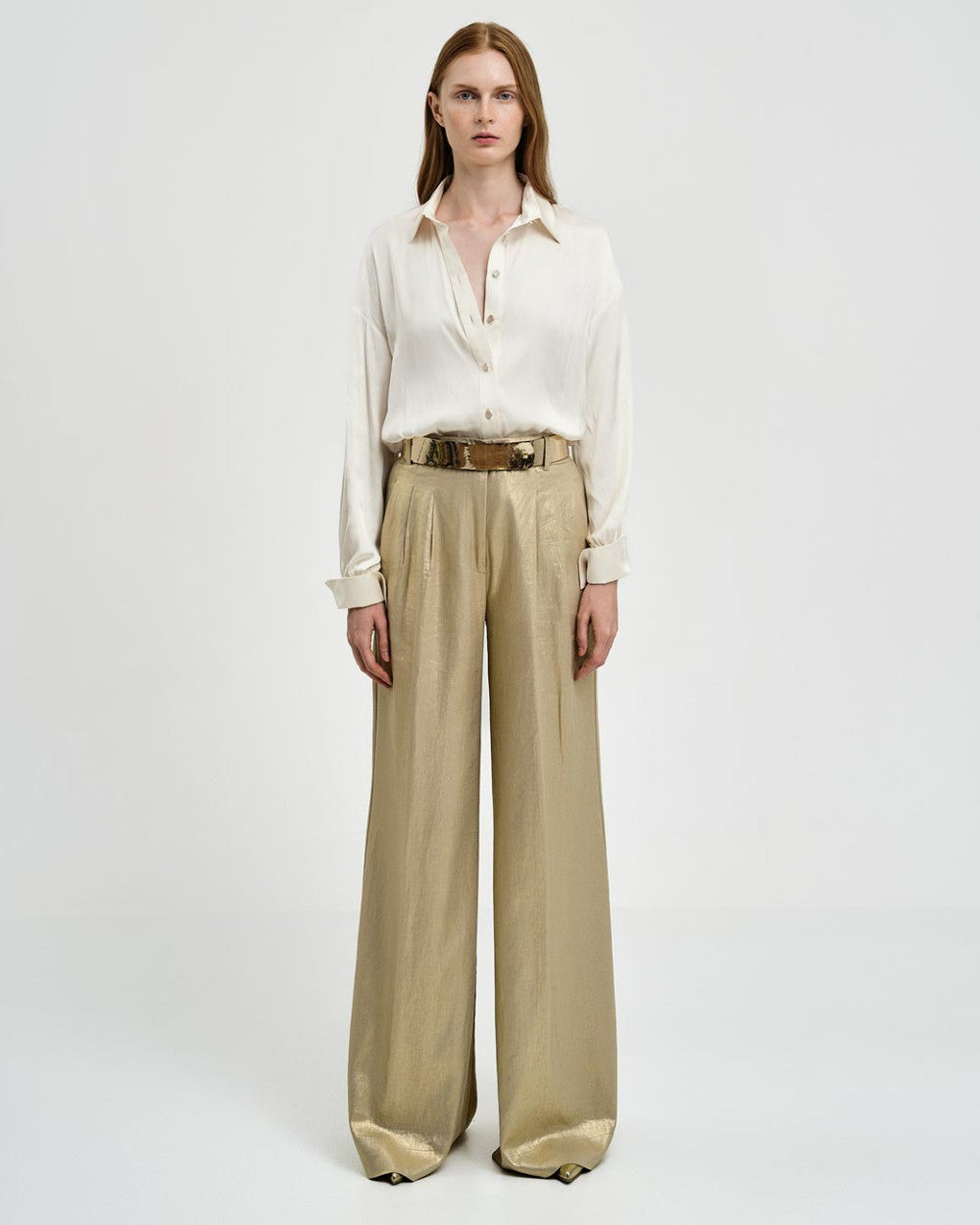 Pantaloni con piega effetto metallizzato