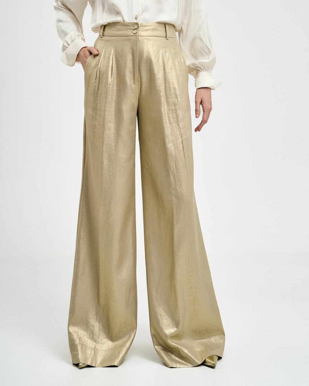 Pantaloni con piega effetto metallizzato
