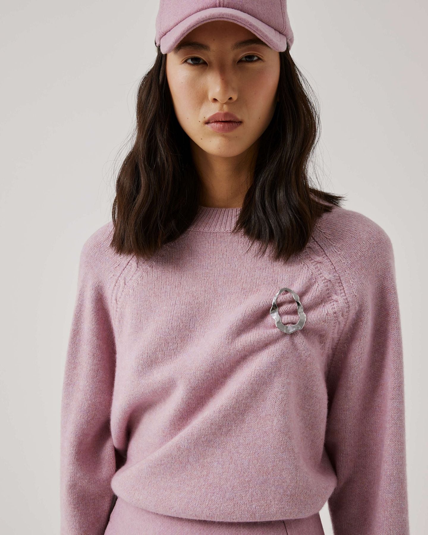 MAGLIONE CON TRECCE