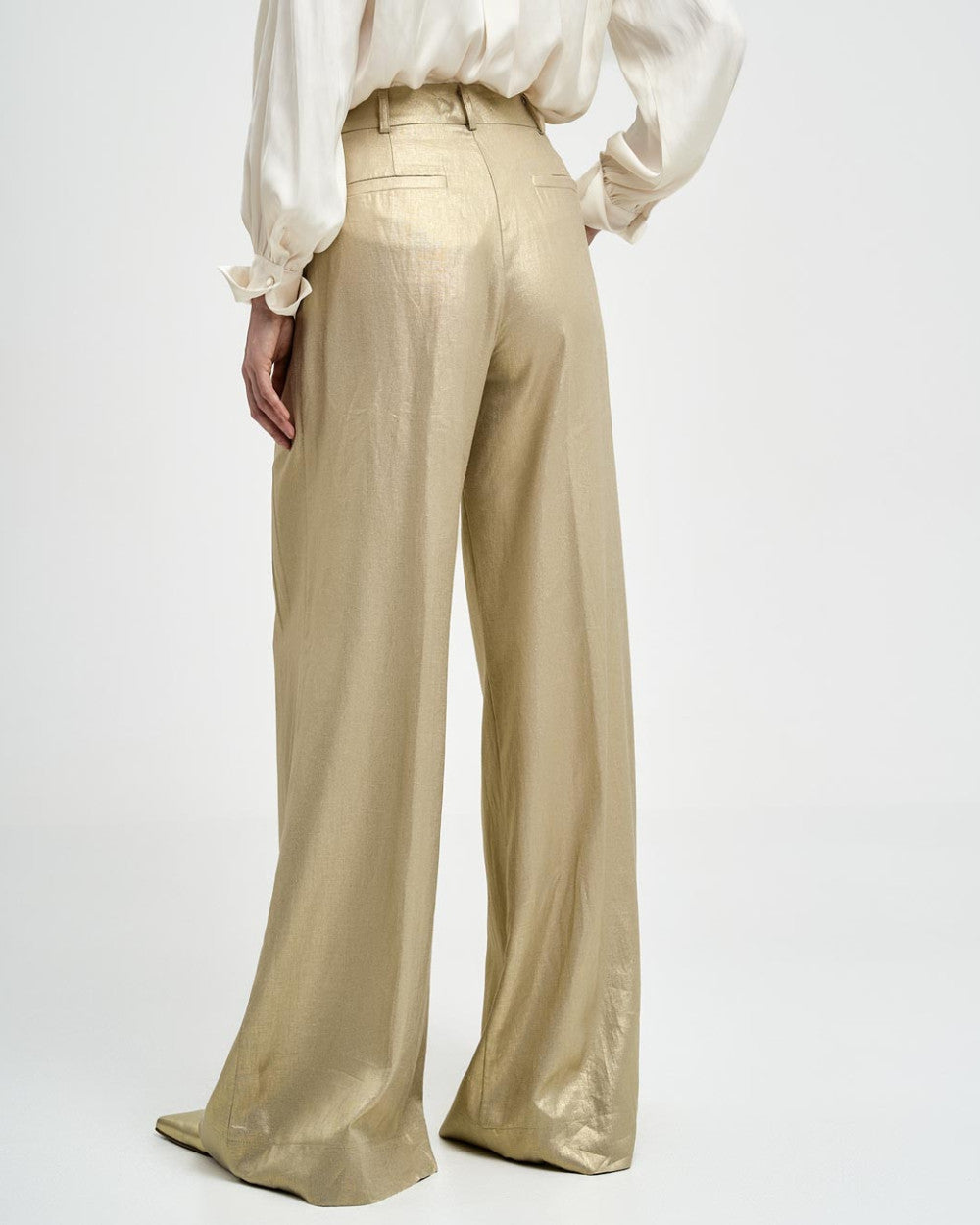 Pantaloni con piega effetto metallizzato