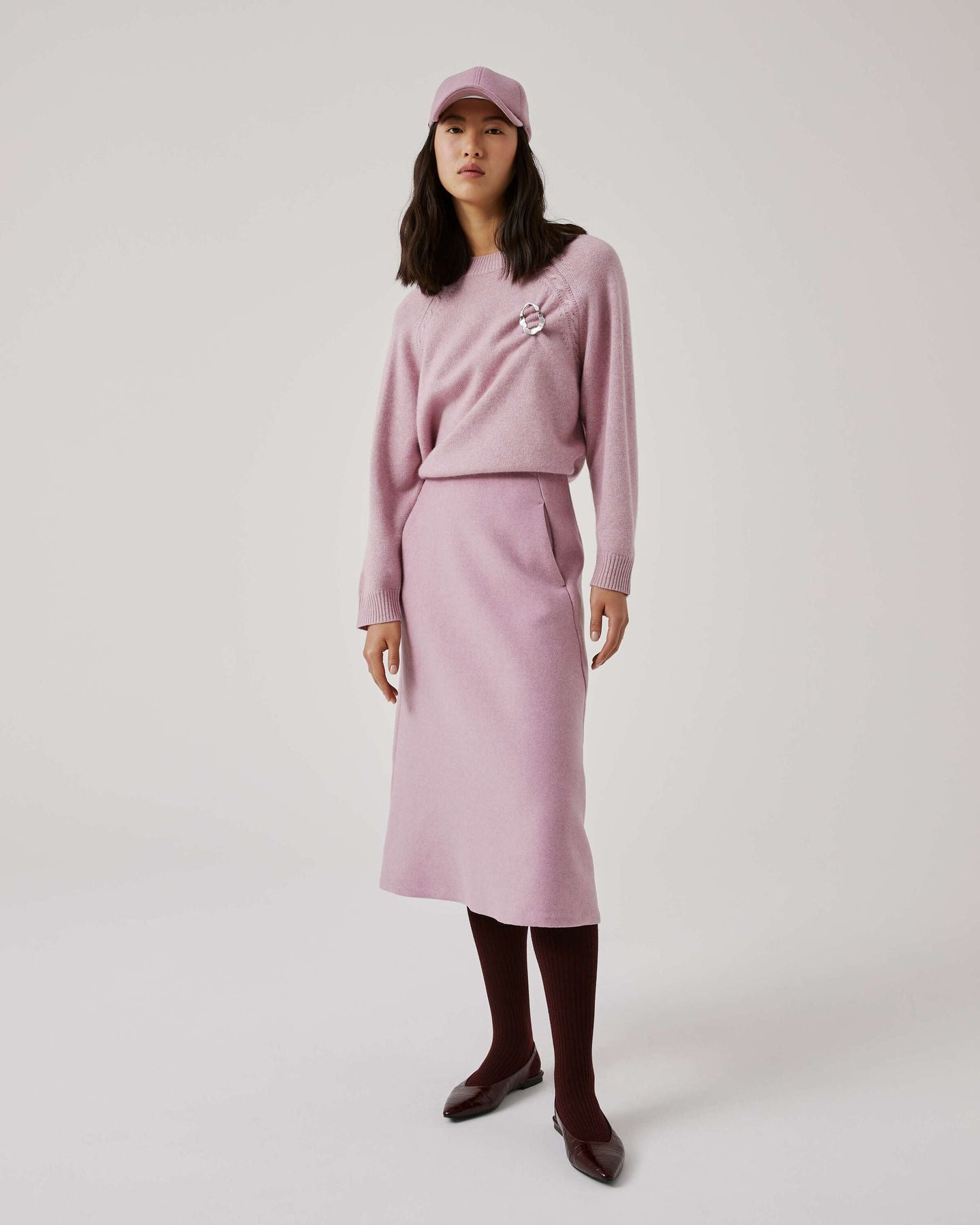 MAGLIONE CON TRECCE